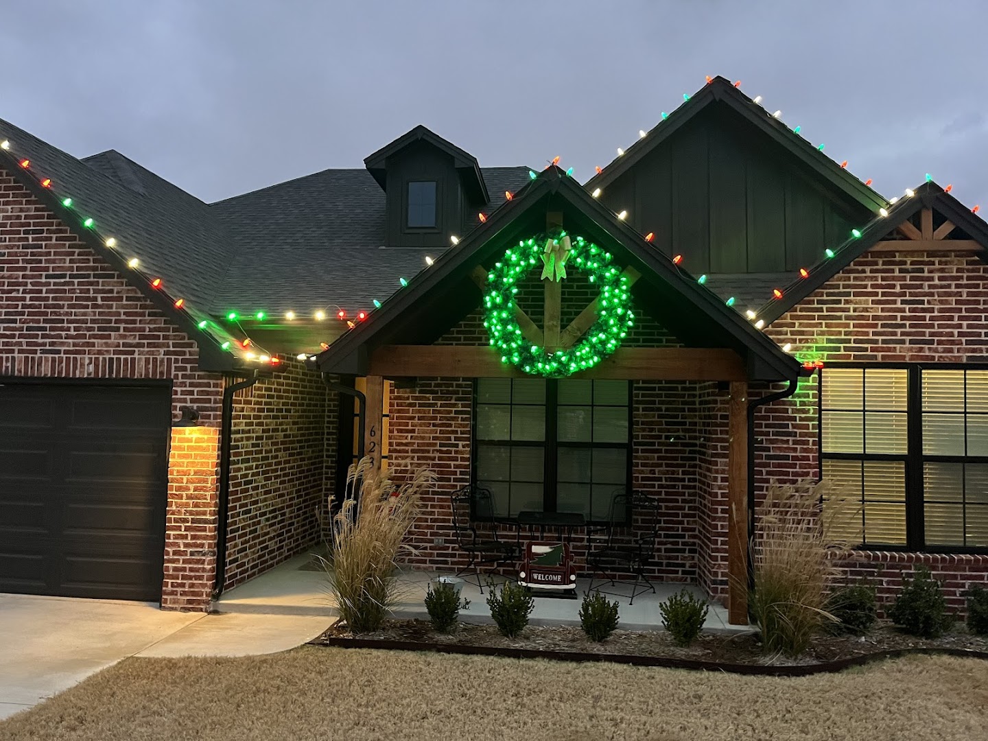 Home with holiday lighting installed by F5, Tulsa OK