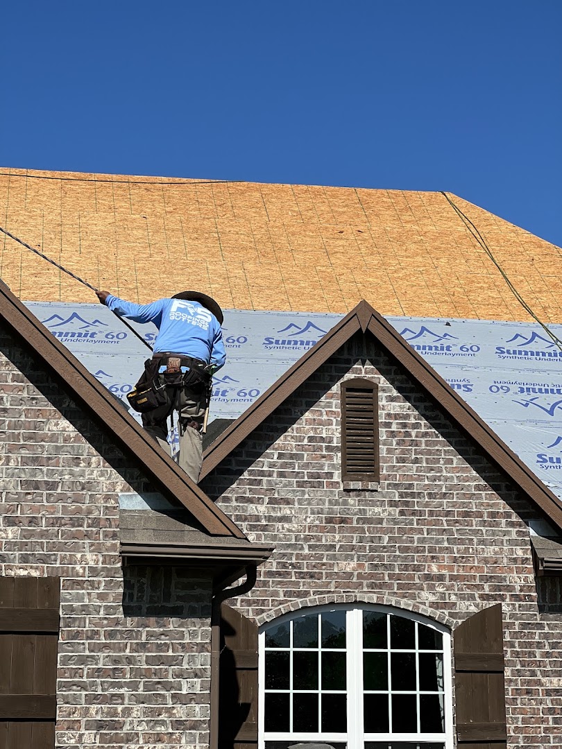 Roofer working on a shingle roof, Tulsa OK